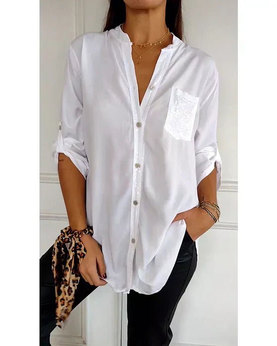 Stylish women's sequin blouse featuring all-over sparkle; a chic top for versatile elegant fashion.