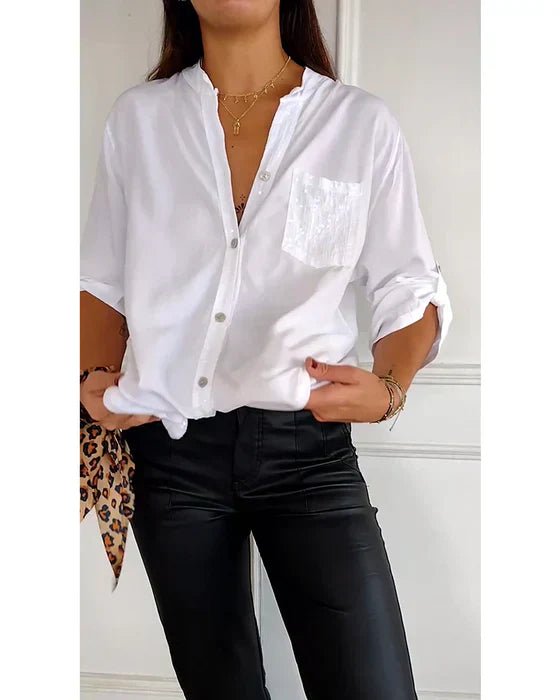Elegant sequin blouse for women, transitioning seamlessly from daytime fashion to sparkling evening wear.