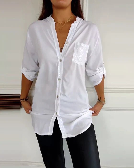 Relaxed fit women's sequin top, combining comfort with elegant sparkle for chic casual glamour.