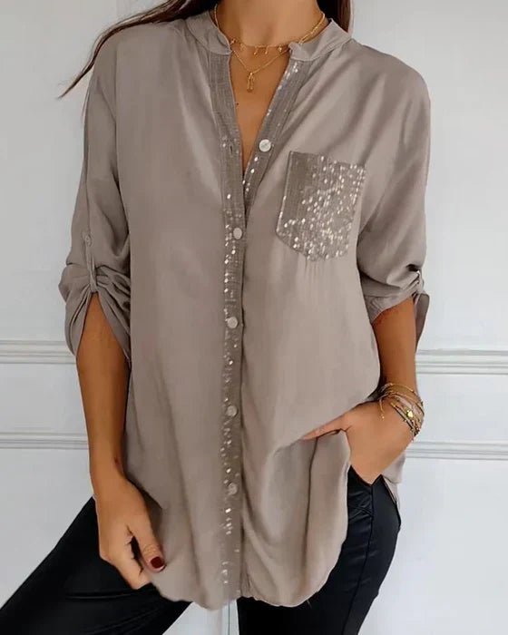 Party-ready women's sequin top. Elegant sparkle blouse designed for chic evening wear & sophisticated glamour.
