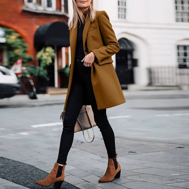Sophisticated women's trench blazer coat. Elegant all-season outerwear, ideal for business and casual layering.