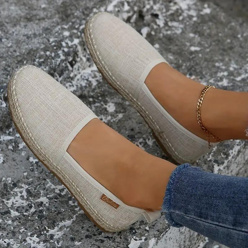 Women's flat espadrille shoes, perfect for lightweight summer comfort. Ideal slip-on casual footwear.