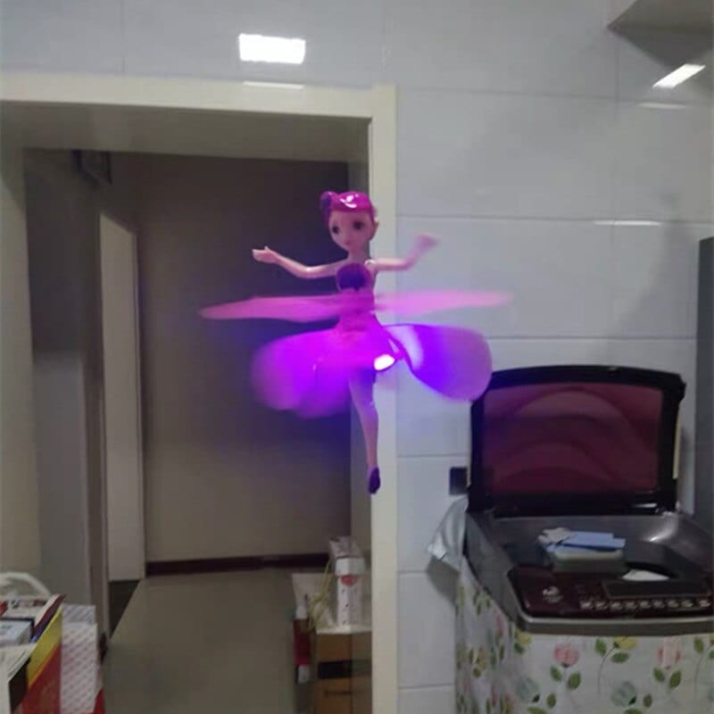 Enchanting flying fairy doll, a responsive sensor toy for magical kids' playtime.