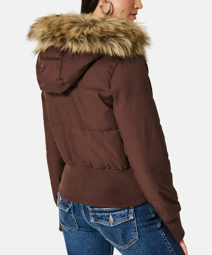 Chic women's warm winter puffer jacket featuring a trendy hood design.