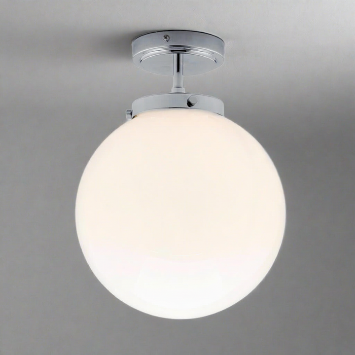 Close-up of modern moisture-resistant LED ceiling light. Durable fixture with warm, energy-saving illumination.