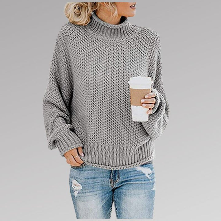 Comfortable women's long sleeve knitted sweater, a timeless piece for versatile layering and everyday wear.