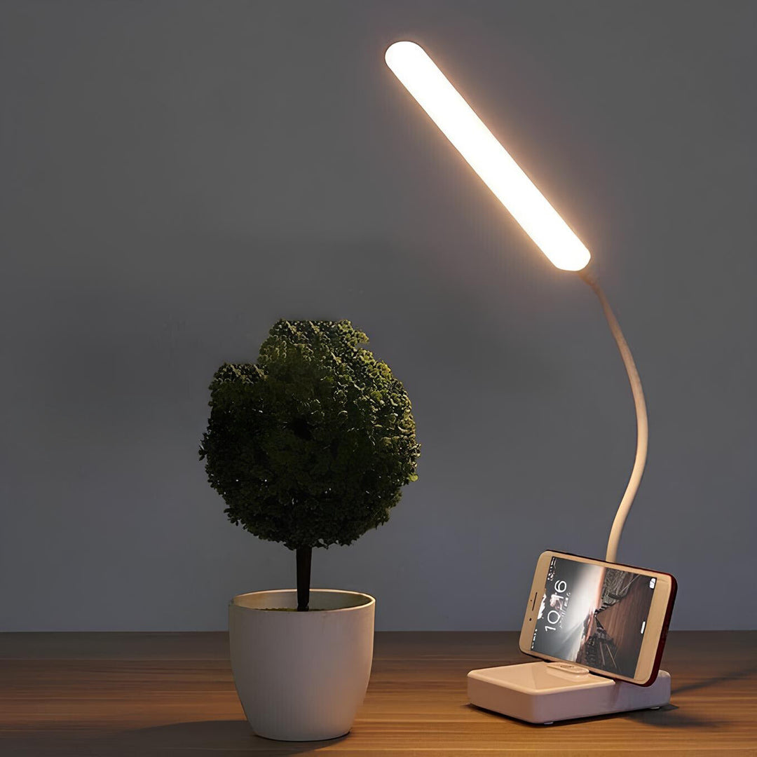 Flexible arm LED desk lamp by Nvroome. Dimmable light for ergonomic office or home reading & task lighting.