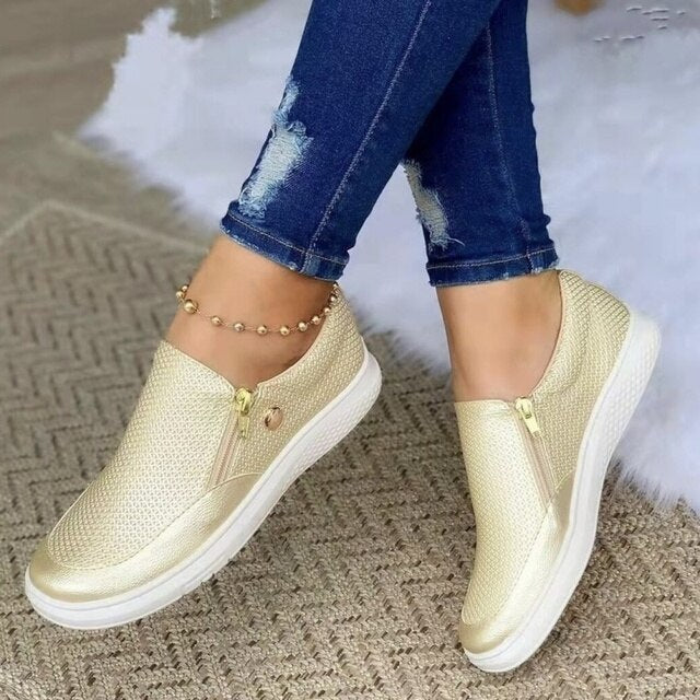 White women's breathable orthopedic walking shoes, offering stylish comfort & foot pain relief.