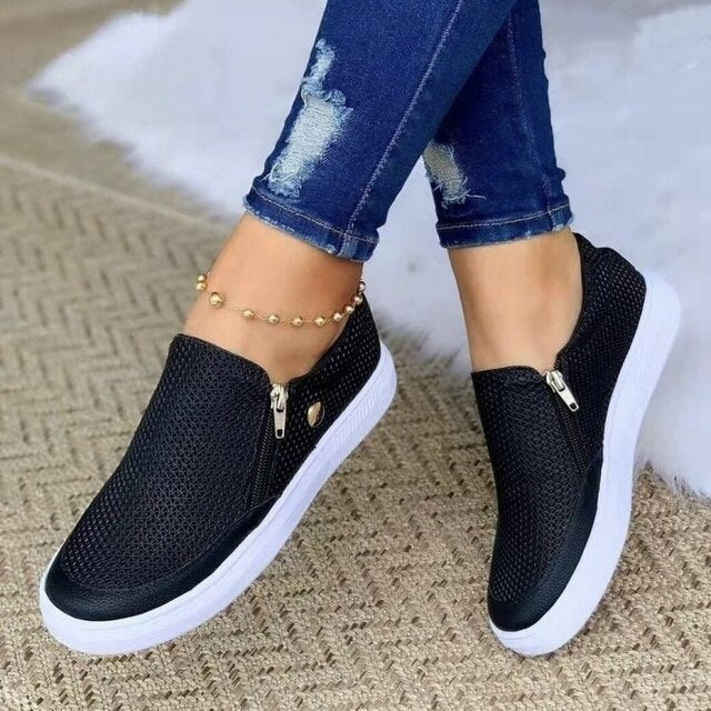 Stylish black women's orthopedic slip-on comfort shoes, breathable for walking & foot pain relief.