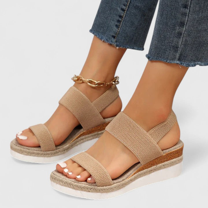 Elegant women's comfort sandals with ergonomic arch support and a cushioned sole.