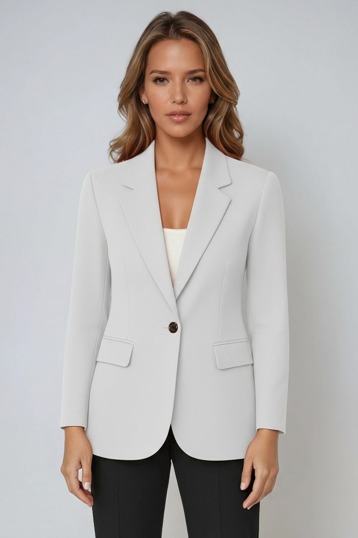 Stylish women's single-button blazer. Tailored jacket, chic outerwear for professional & casual looks.