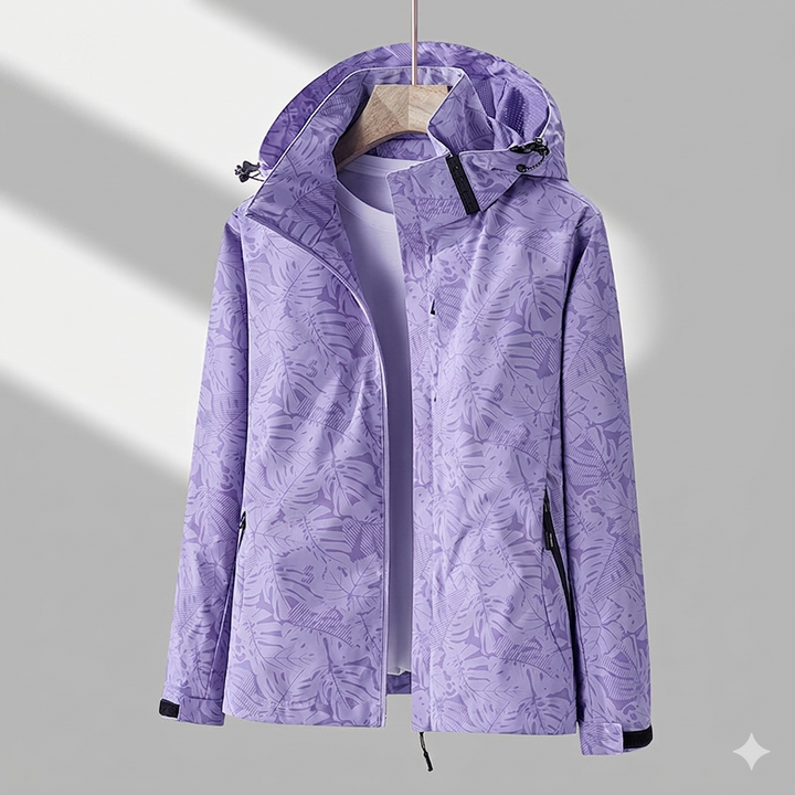 Lightweight women's rain jacket for hiking & travel, offers ultimate weather protection.