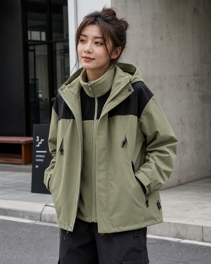 All-weather women's winter coat, hooded, waterproof & windproof, offering superior protection from elements.