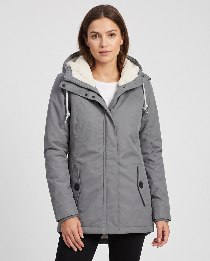 Stylish women's hooded rain jacket, waterproof for everyday wear & all-weather protection.