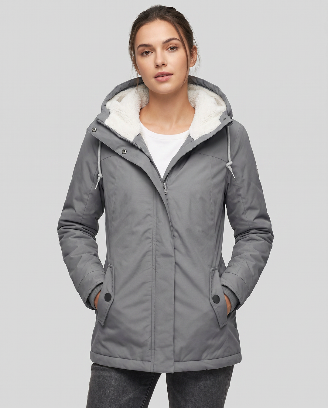 Versatile women's waterproof jacket, hooded for rain protection & modern outerwear style.