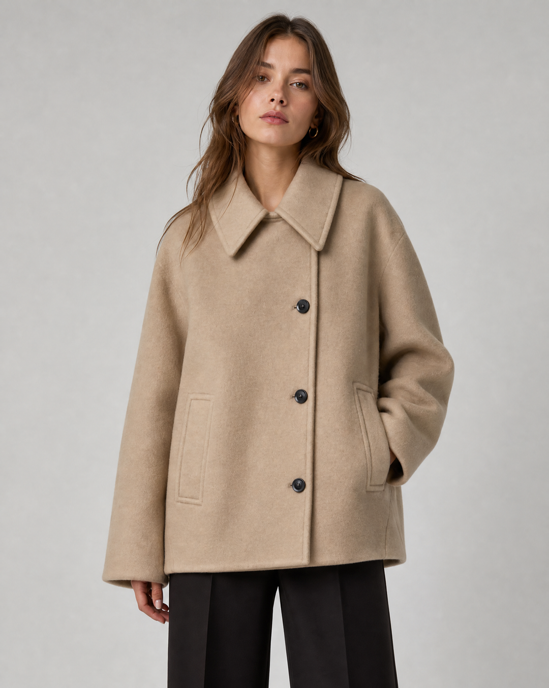 Elegant women's short coat jacket for chic fall/winter fashion. Perfect sophisticated outerwear.