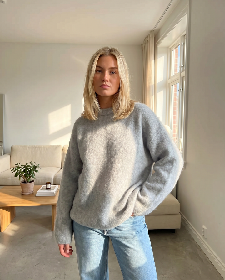 Relaxed fit women's knitwear sweater, warm and cozy for fall fashion and versatile layering.