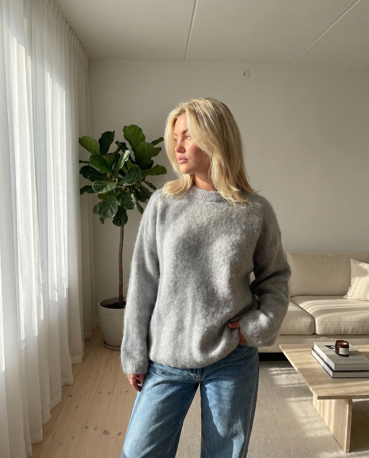 Women's Cozy Elegant Knit Sweater in a relaxed fit, perfect for fall and winter layering.