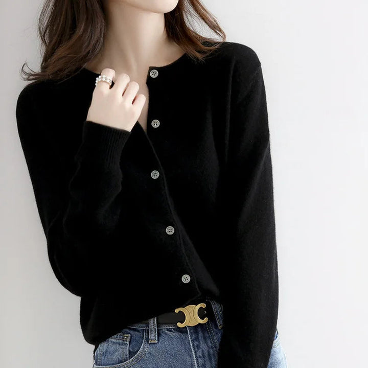Comfortable women's button-front cardigan, a cozy long-sleeve sweater for elegant and versatile everyday style.