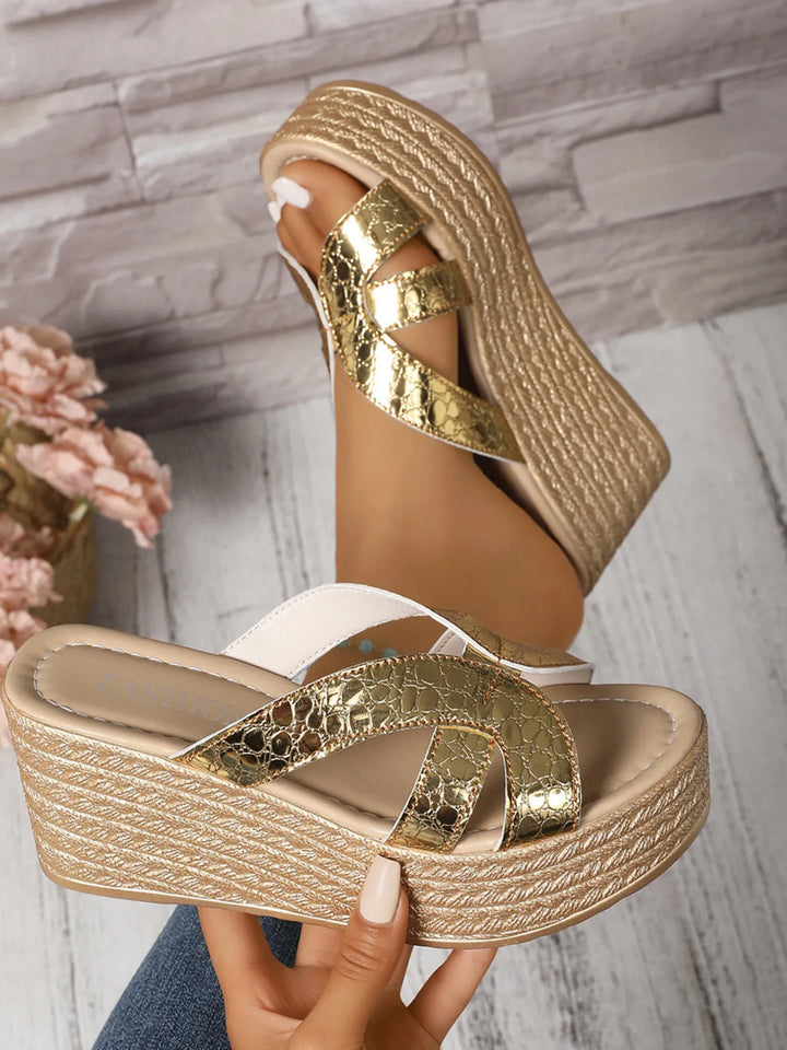 Glamorous women's platform wedge sandals with a shimmering finish, offering comfortable high heels for dressy occasions.