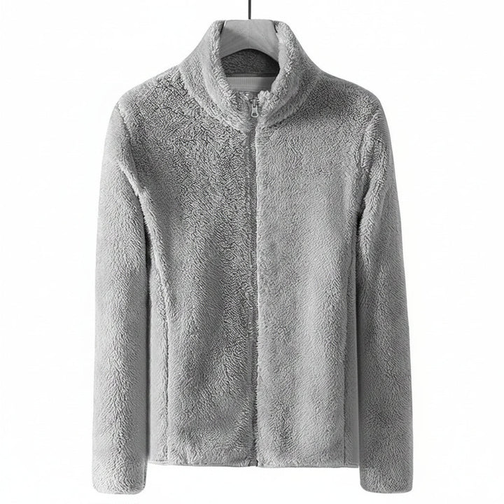 Warm women's plush outerwear, a comfortable zip-up jacket for casual winter and fall layering.