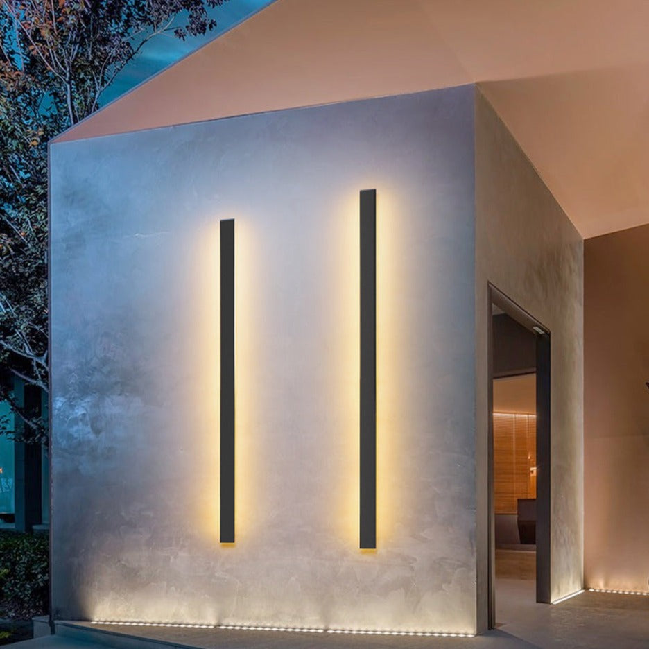 Energy-efficient modern LED outdoor wall sconce. Weatherproof facade light, ideal for contemporary home pathway lighting.