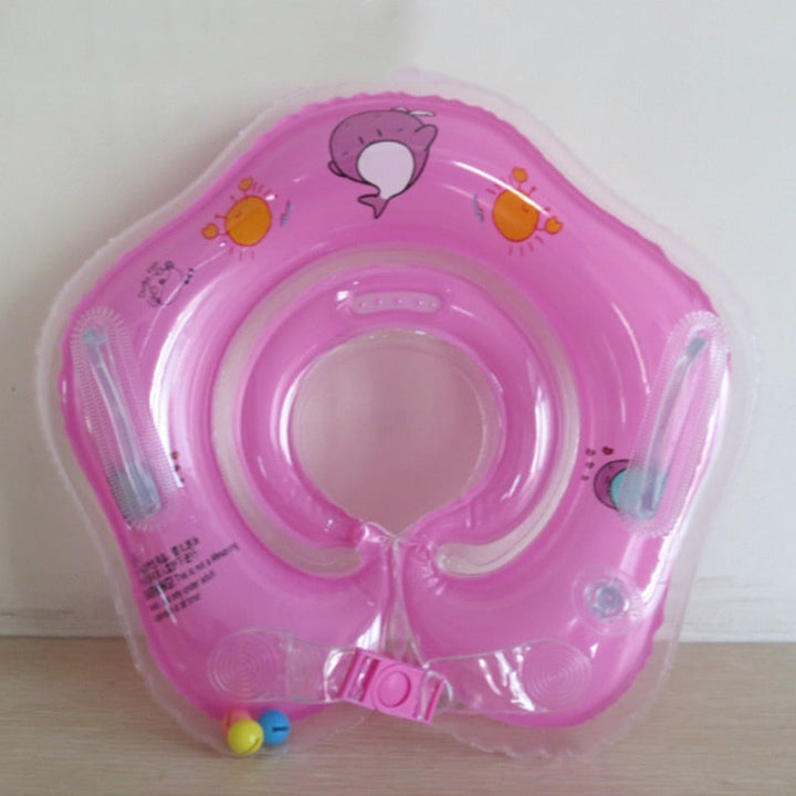 Happy infant enjoying bath time safely with a comfortable, secure inflatable neck float. Developmental.