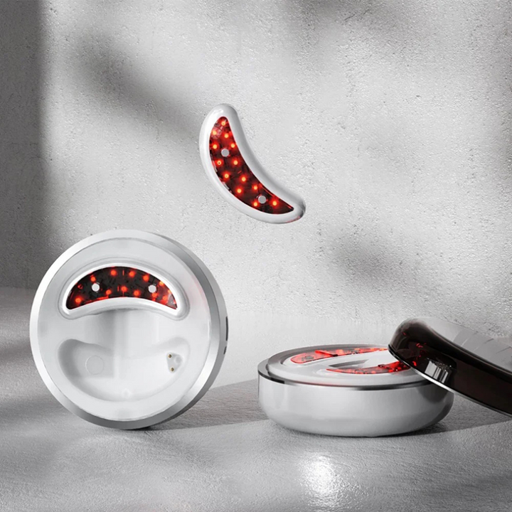 Red light therapy eye massager for youthful eyes, reducing wrinkles, dark circles & puffiness with EMS.