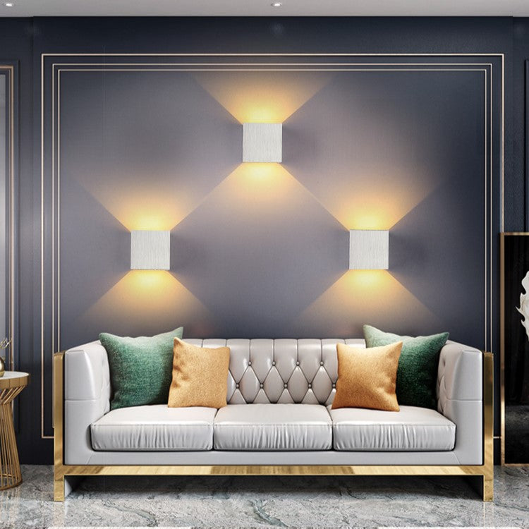 Sleek LED Cube Wall Sconce. Up & down light adds modern accent to any indoor/outdoor setting.