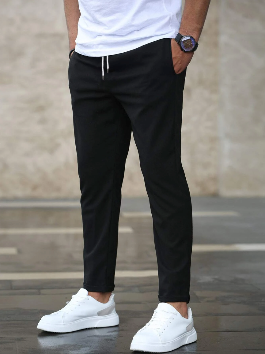 Full-length men's comfortable stretch fleece pants, showcasing modern fit and versatile style.