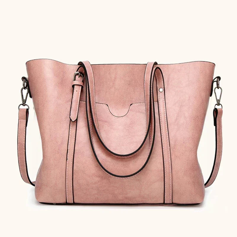 Spacious women's luxury genuine leather handbag with elegant design, ideal for daily essentials.