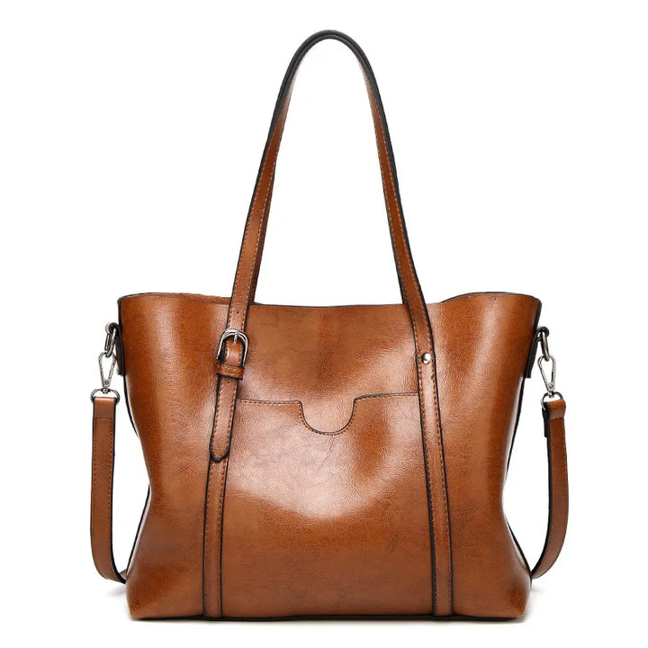 Elegant women's luxury genuine leather handbag, a perfect fashion accessory for sophisticated style.