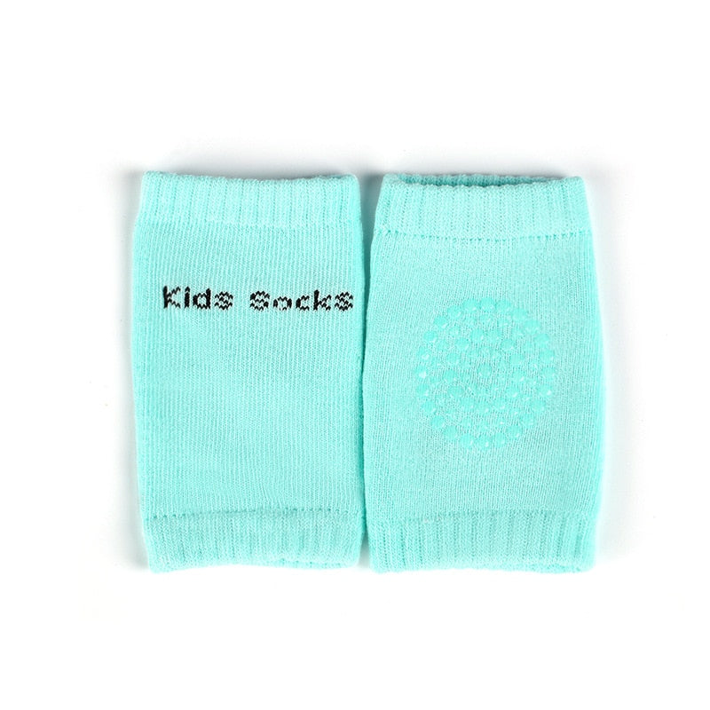 Baby explores safely with ergonomic non-slip knee pads. Crucial crawling protection for active infants.