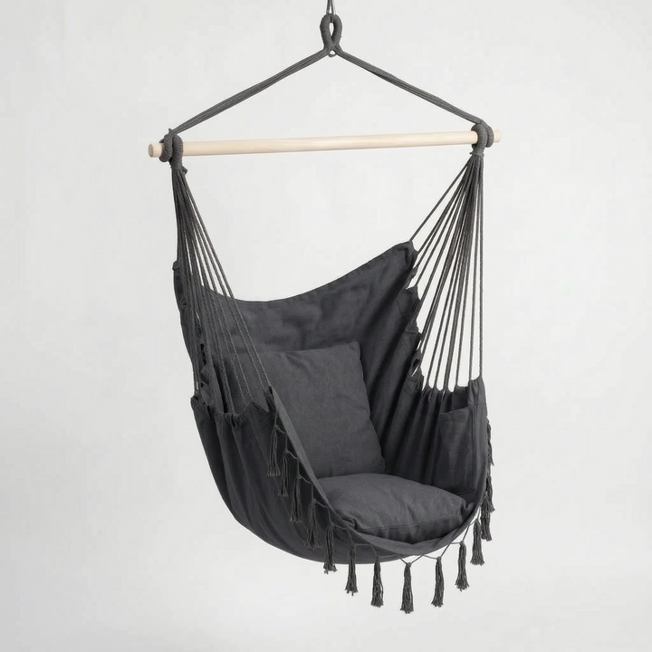 Cozy indoor hanging hammock chair, perfect for a reading nook, bedroom, or living room relaxation.