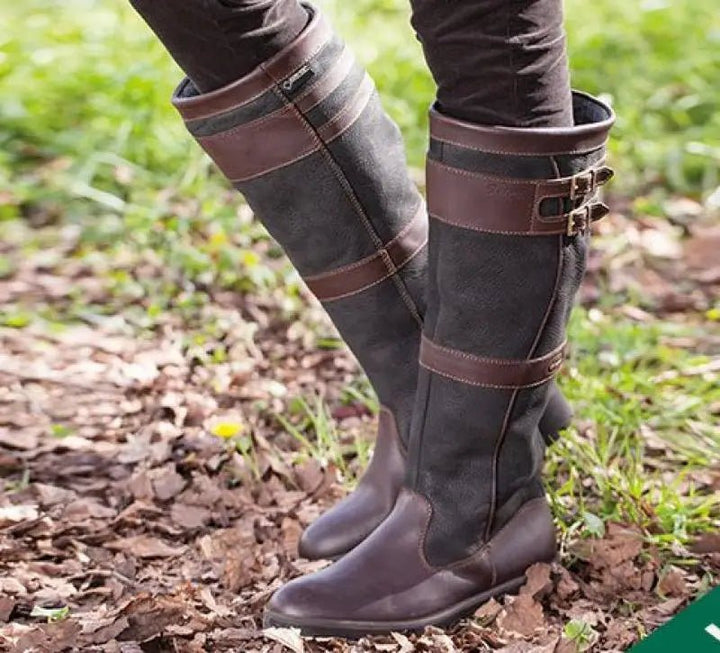 Women's waterproof knee-high pull-on boots for elegant fall & winter fashion. Classic comfort & weather protection.