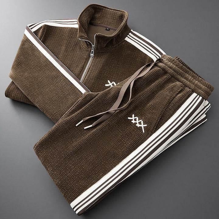 Unisex cozy winter tracksuit set in stylish gray, perfect for warmth & casual wear. Two-piece loungewear.