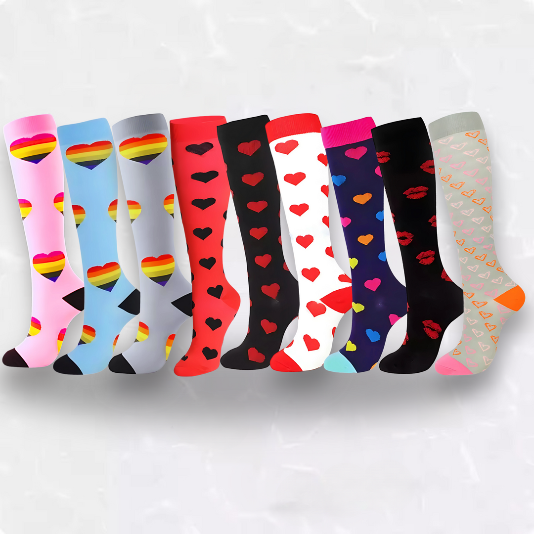 Pair of women's heart pattern compression socks, ideal for circulation, travel & everyday comfort.