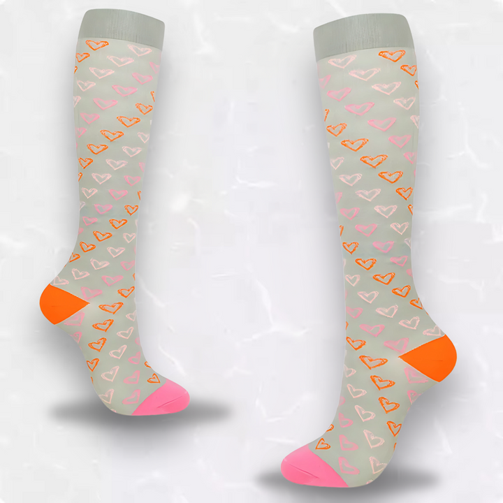 Elegant women's heart pattern compression socks, combining style with effective circulation support.