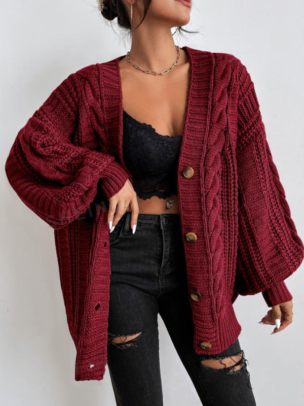 Trendy women's oversized cable knit cardigan, designed for a relaxed fit and ultimate fall comfort.