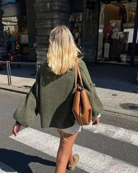 Soft women's fluffy oversized sweater, a warm pullover designed for cozy casual wear & comfortable winter fashion.