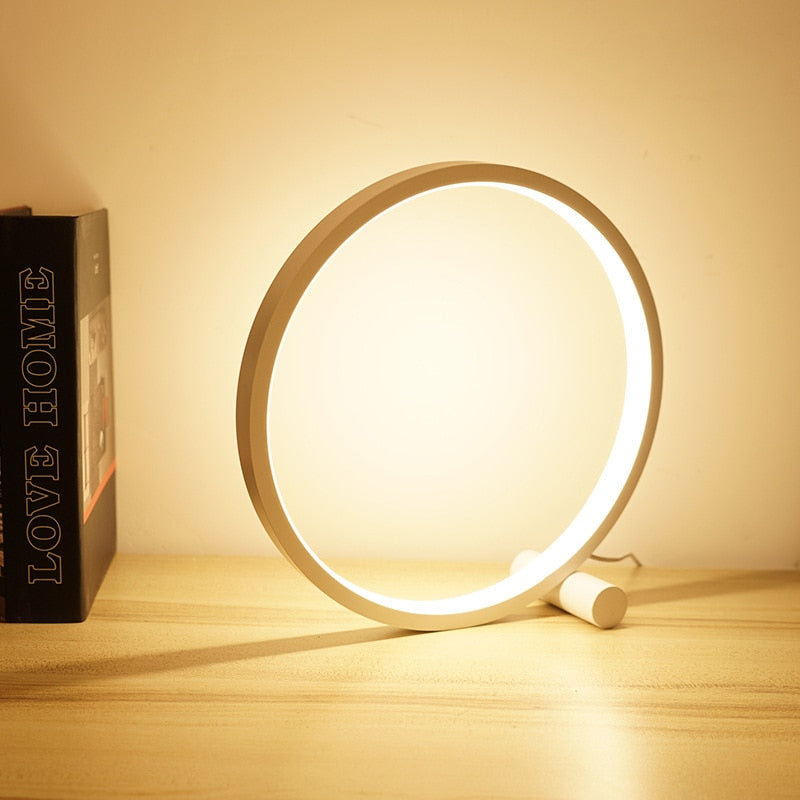 Elegant dimmable LED halo ring lamp, Nvroome design, perfect for bedroom or living room accent light.