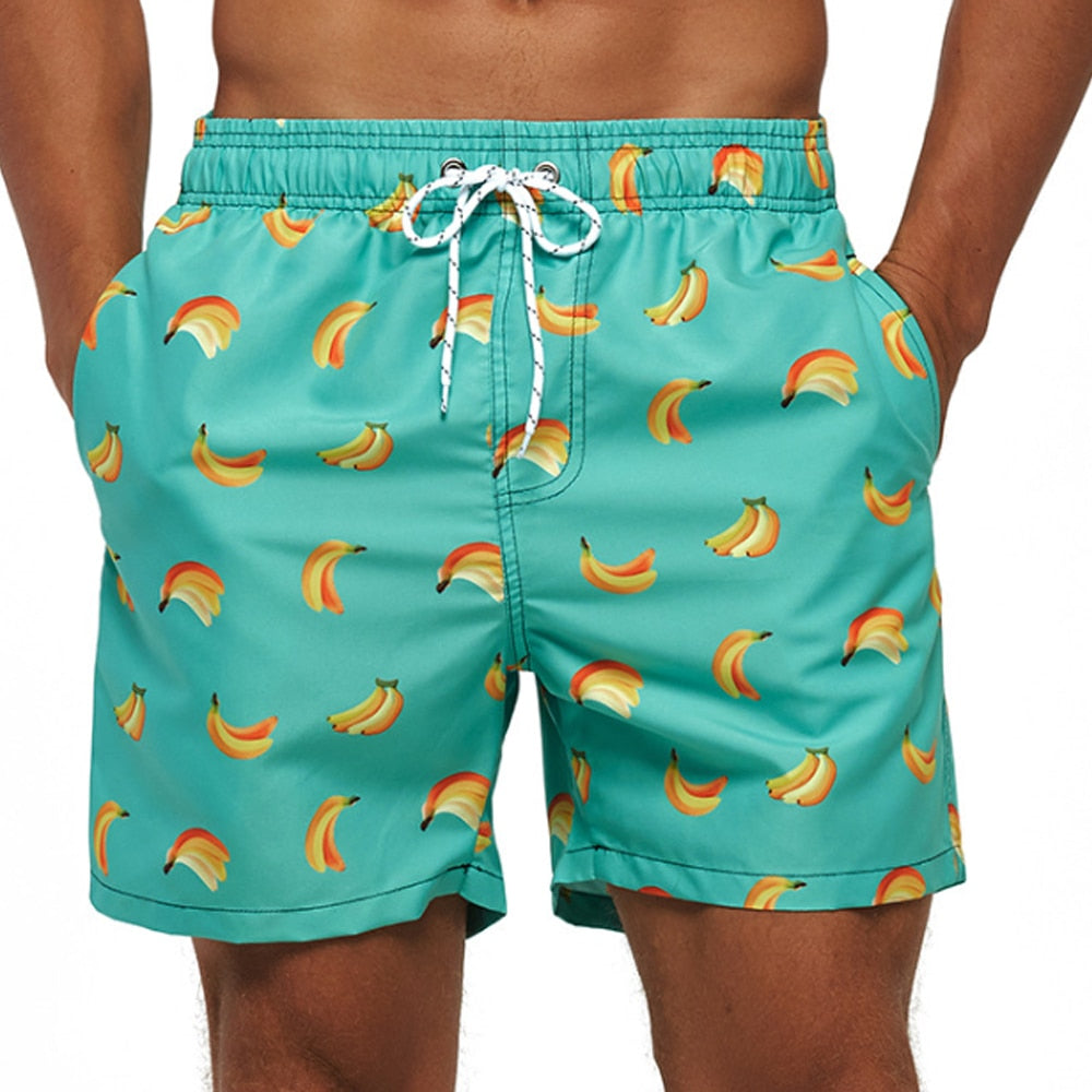 Quick-dry men's swim shorts with vibrant print, ideal for resort wear.