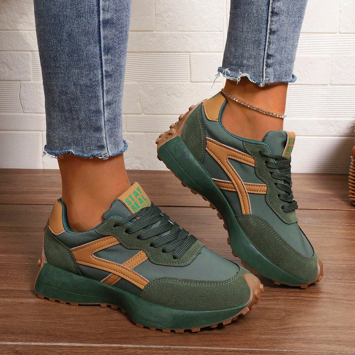 Supportive women's orthopedic sneakers, wide fit, for all-day walking comfort.