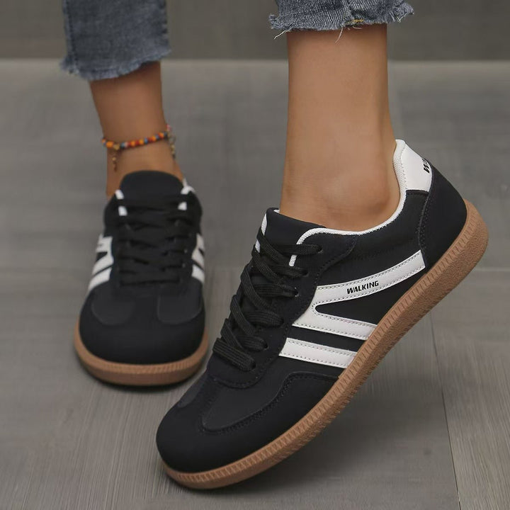 Comfort-focused wide fit women's trainers, essential for daily activity.