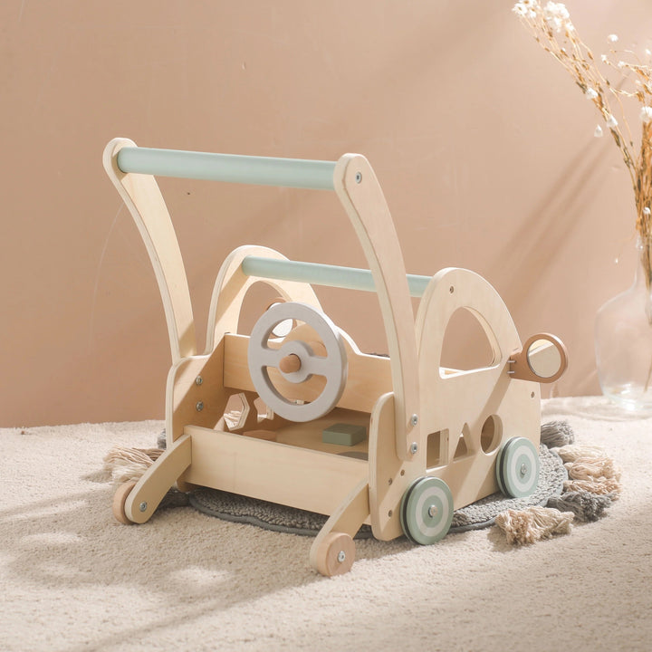 Baby's first wooden push walker featuring a sturdy design, sensory mirrors & engaging Montessori play activities.