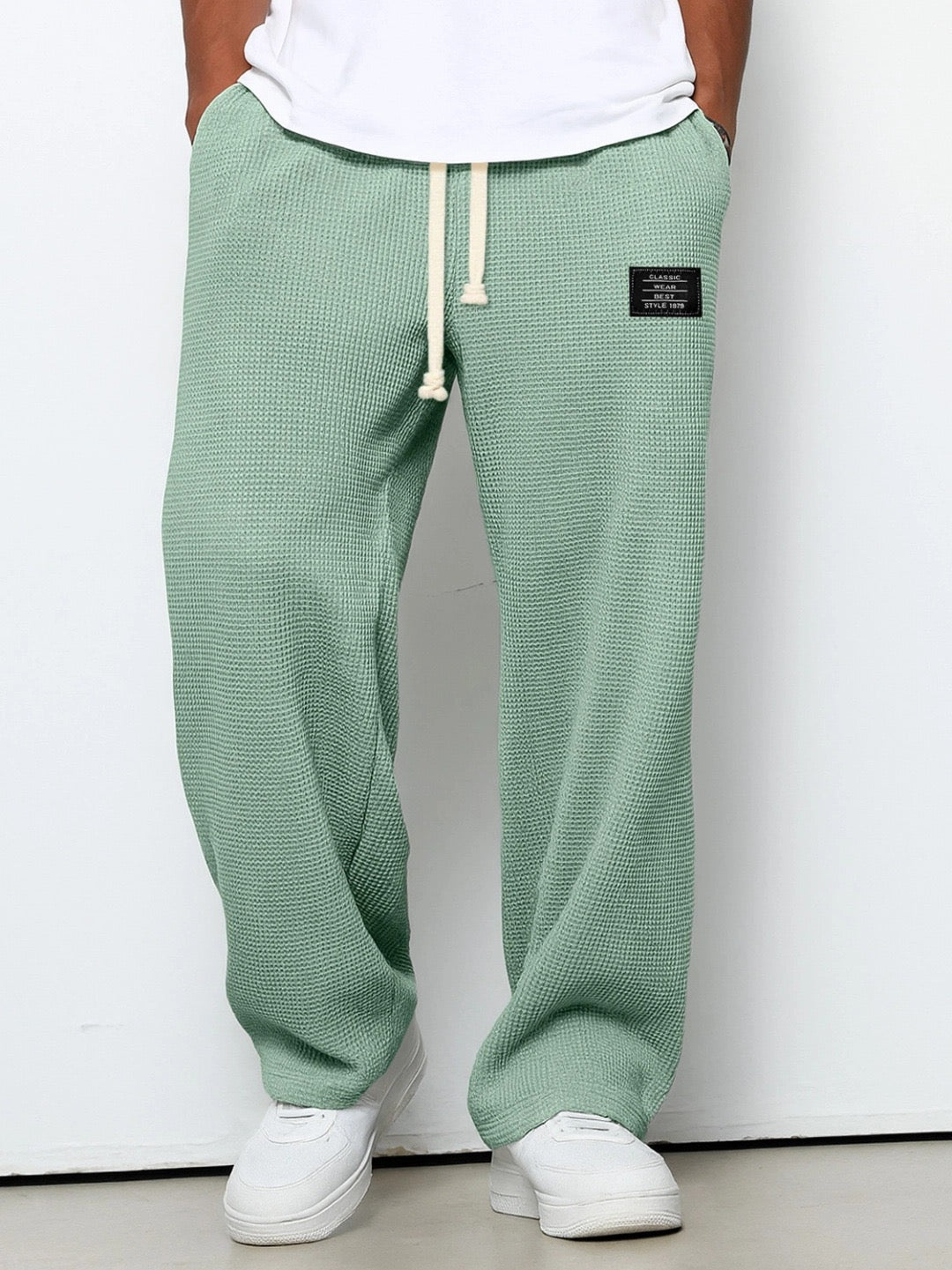 Men's casual waffle knit wide leg pants with a comfy elastic drawstring waistband.