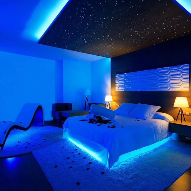 Flexible Nvroome RGB LED strip light creating mood lighting; easily controlled with included remote.