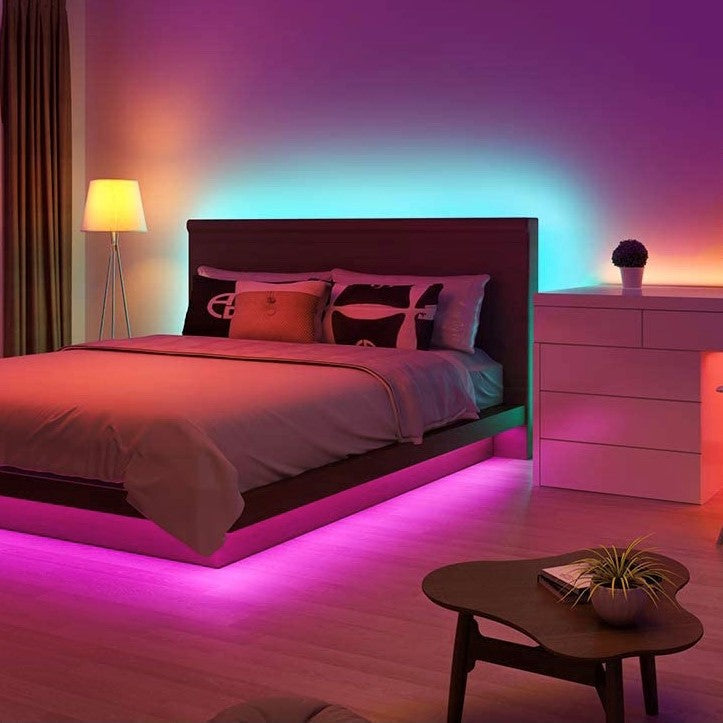 Color-changing RGB LED strip light with remote control for versatile home accent lighting.