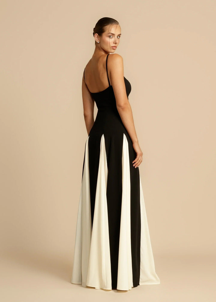 Sophisticated full-length women's maxi dress. Elegant formal gown for evening parties & special occasions. Graceful attire.