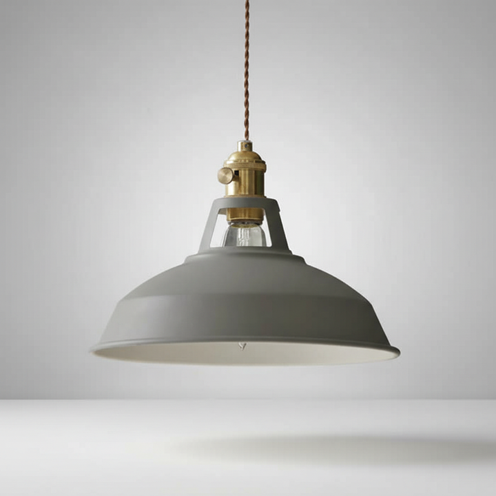IndustroGlow industrial metal pendant light, a stylish centerpiece for your dining room.